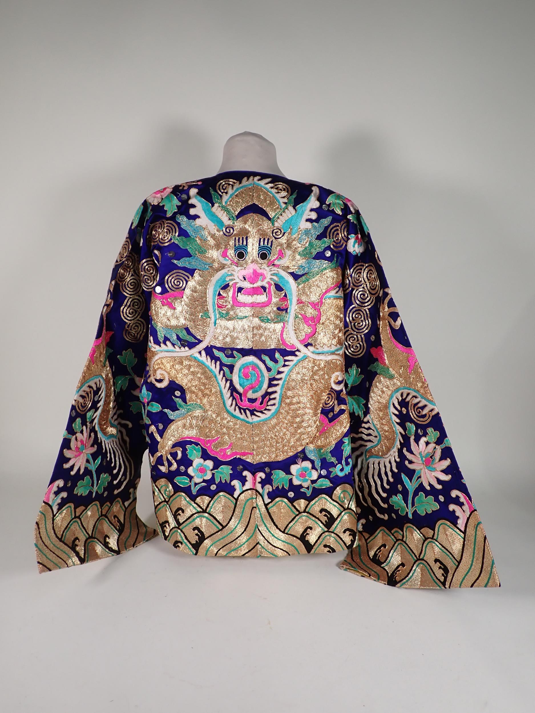 A late 19th/early 20th Century Chinese blue silk Jacket, embroidered gold and polychrome dragon, - Image 3 of 16