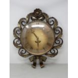 An IMHOF Wall Clock with bronze leafage floral and ribbon decorated Case, converted to battery