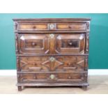 A late 17th Century moulded oak Chest of four long drawers of varying depths beneath moulded top