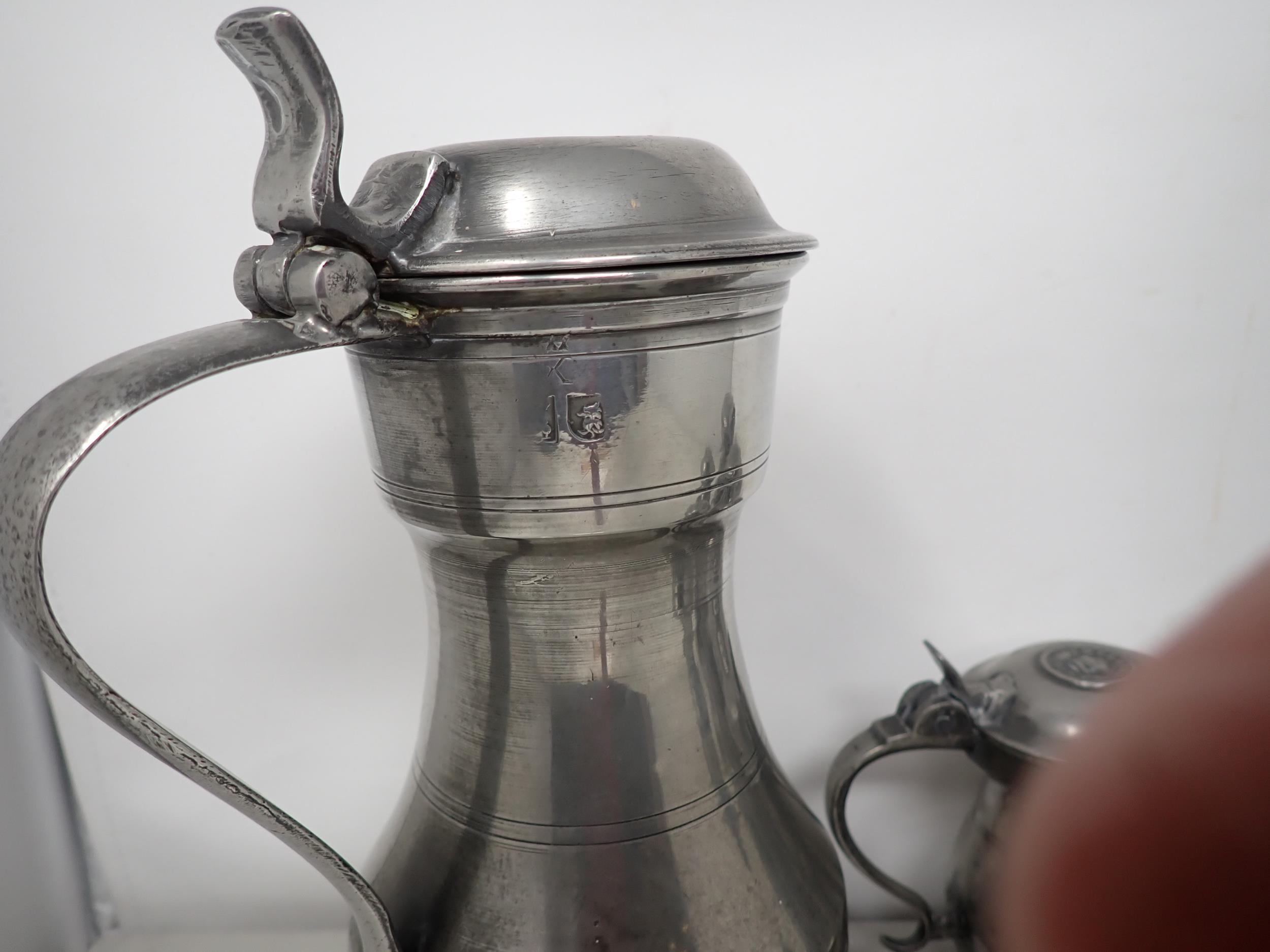 An antique pewter Tappit Hen, with domed lid and plain thumb piece, 10½in, marked with lion's - Image 3 of 3