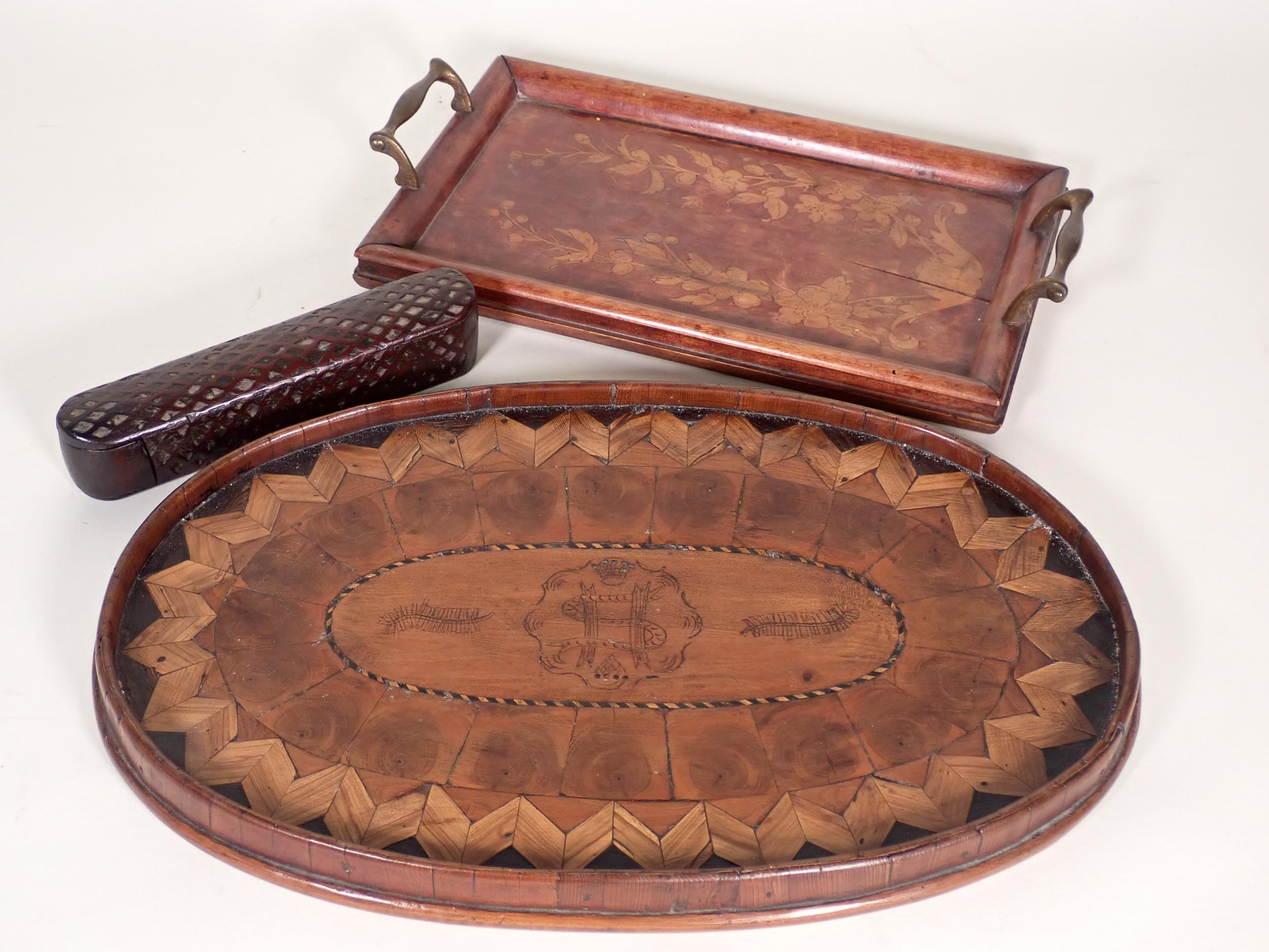 A 19th Century parquetry oval Tray with penwork feather and armorial crest design 15in W, an antique