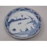 A Ca Mau Shipwreck Dish with blue and white design of a figure beside a river, 4¼ in diam