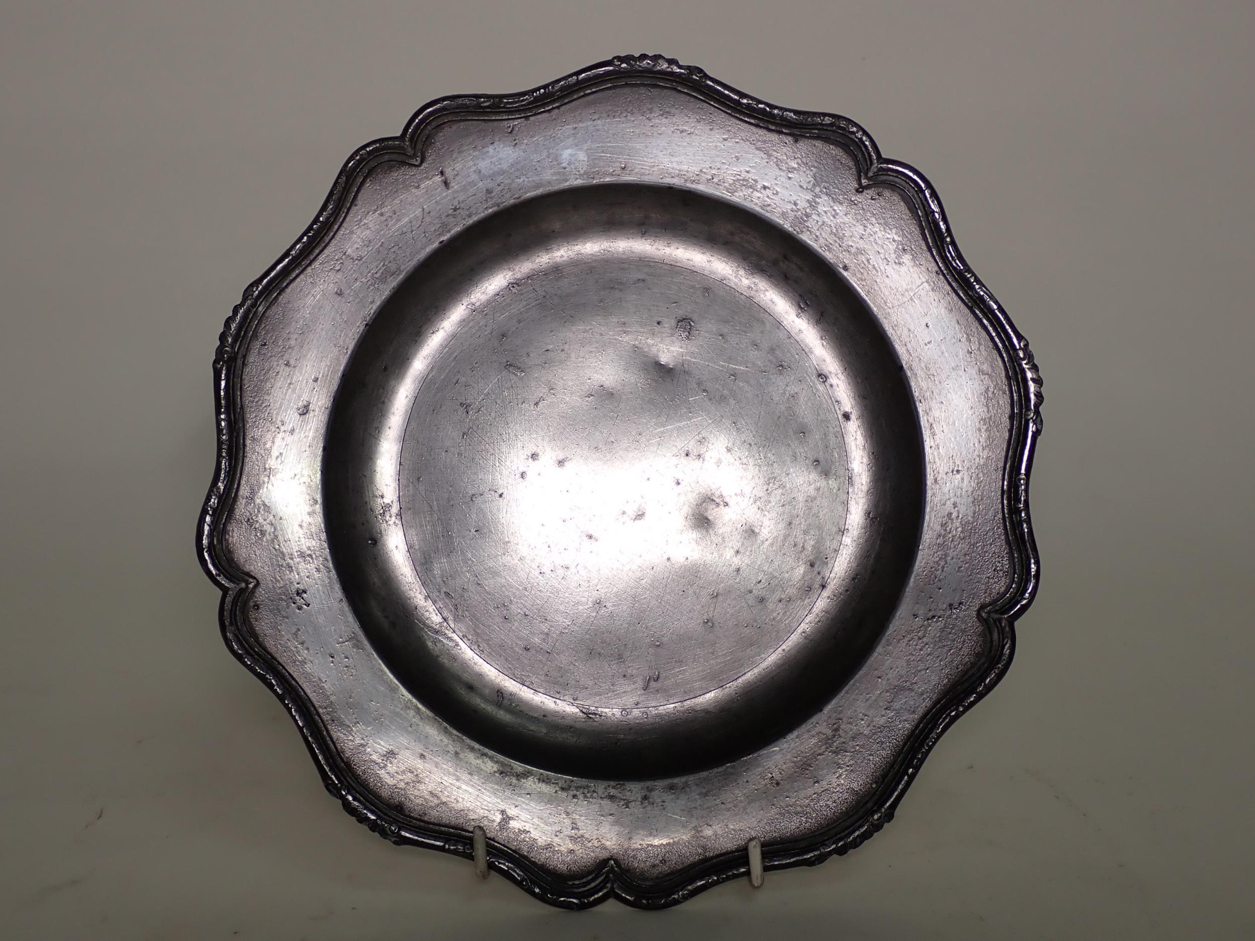 An 18th Century Pewter Dish, Stynt Duncombe, Bewdley, with silver shape rim, 9 1/2 in diam