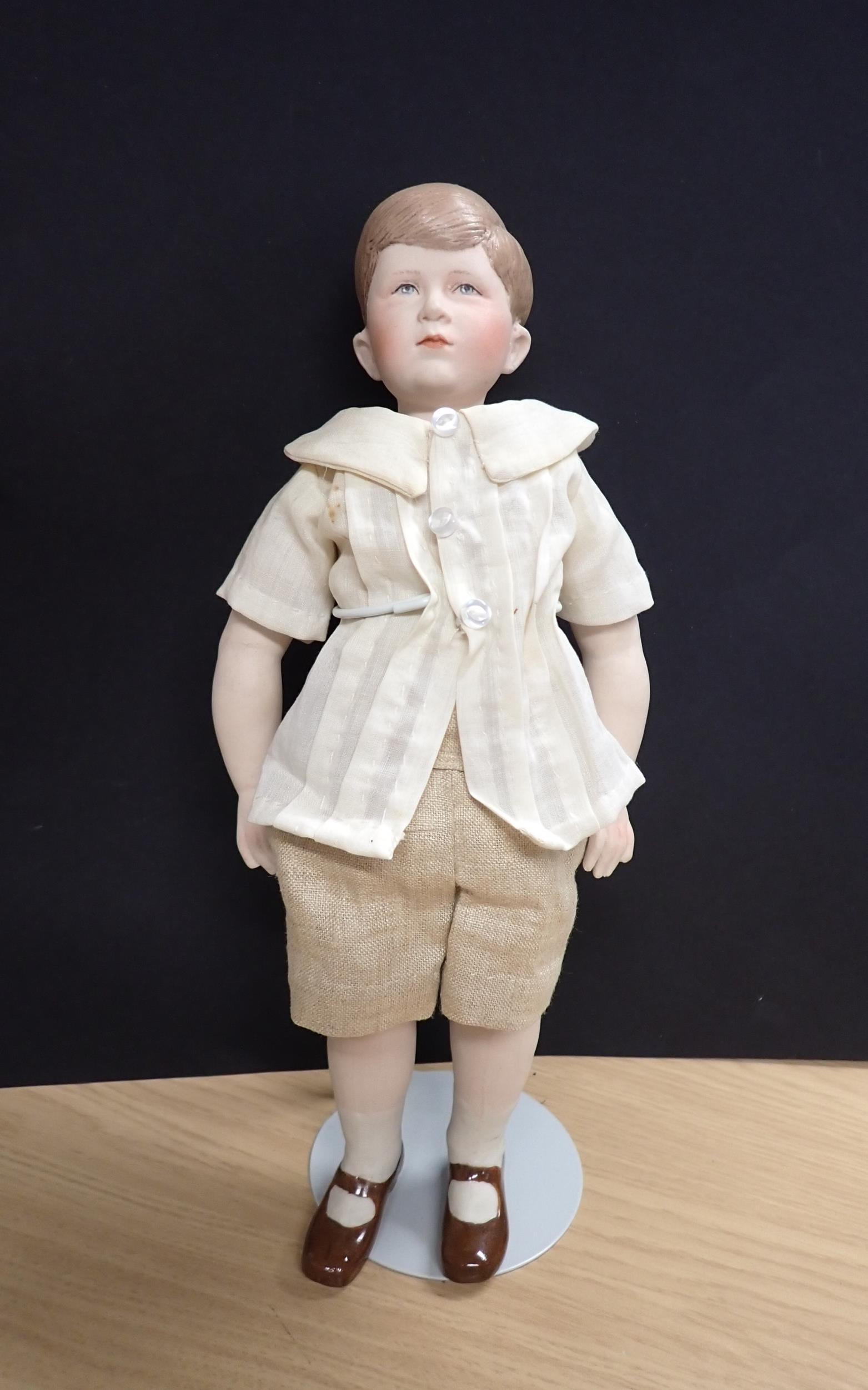 A Prince Charles bisque headed Doll by Martha Thompson USA, 11in