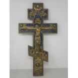 A Greek/Russian? Cross depicting Christ with inscriptions and blue enamel detail, 15in H