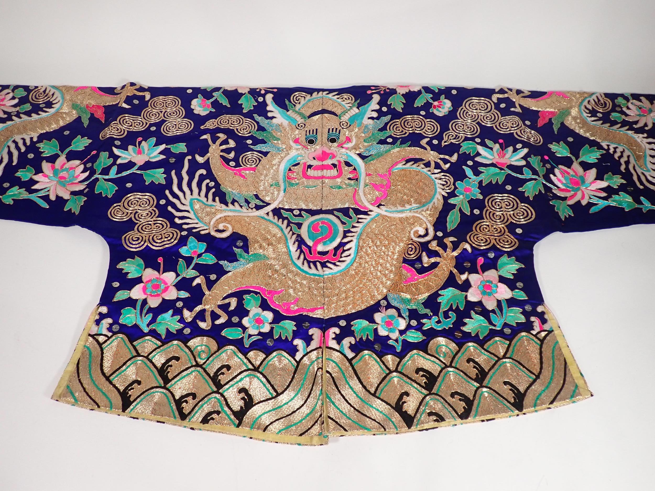 A late 19th/early 20th Century Chinese blue silk Jacket, embroidered gold and polychrome dragon, - Image 6 of 16
