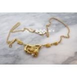 A contemporary Canadian Gold Nugget Necklace the large nugget (tests as 18ct) including some