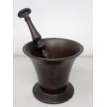 An 18th Century bronze Pestle and Mortar of flared form 4in H