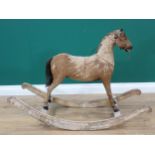 An antique fur covered Rocking Horse on white painted rockers 3ft 2in L x 2ft 2in H