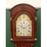 An early 19th Century mahogany Longcase Clock by Charles Howse , London with arched brass dial,