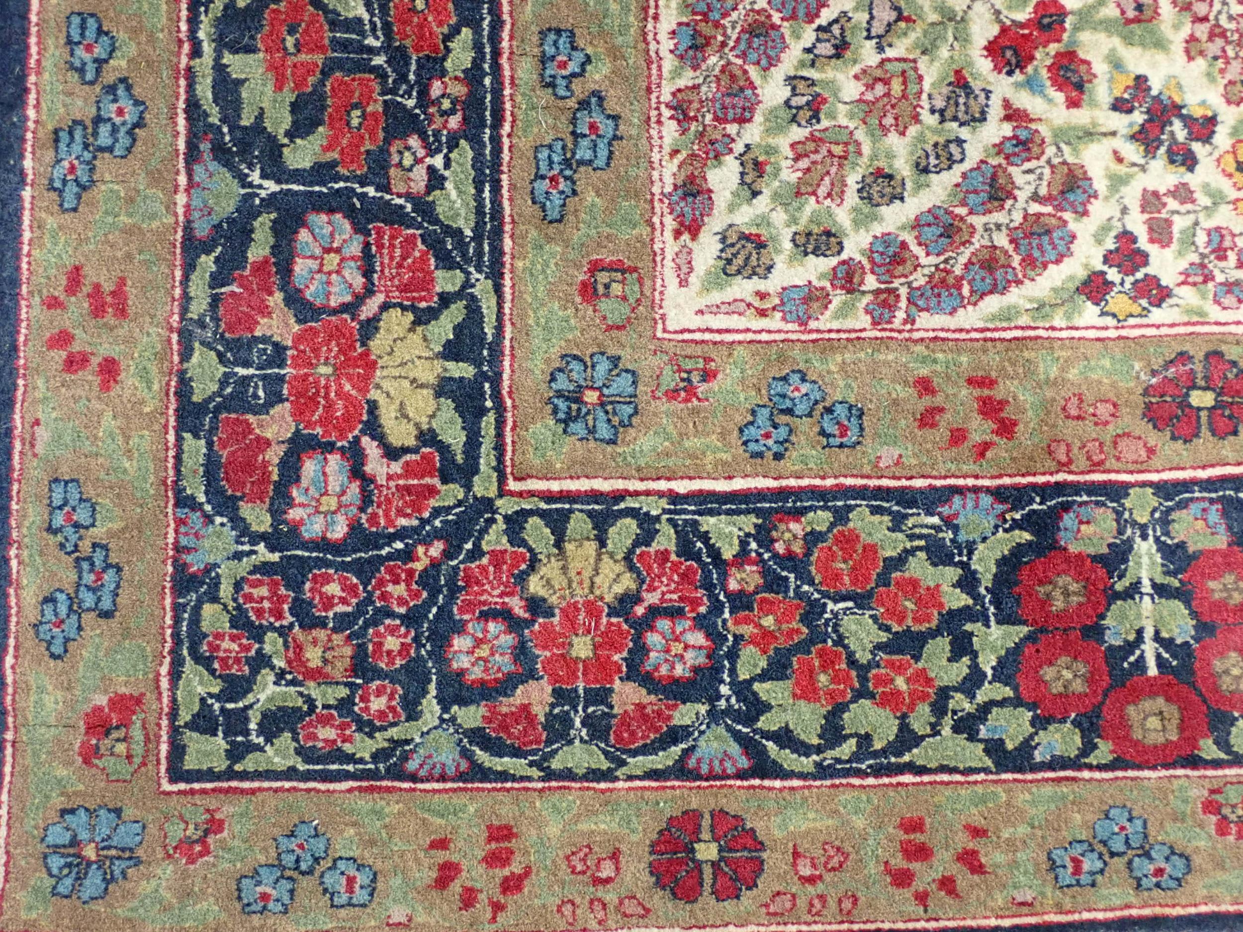 A fine quality Persian Rug with floral designs two the borders, and central oval depicting vase of - Image 3 of 6