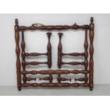 A 19th Century turned fruitwood Wig or Cravat Wall Rack 14 1/2in W x 14in H
