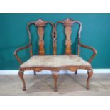 An 18th Century walnut and marquetry inlaid Salon Sofa with double shaped vase splat back surmounted