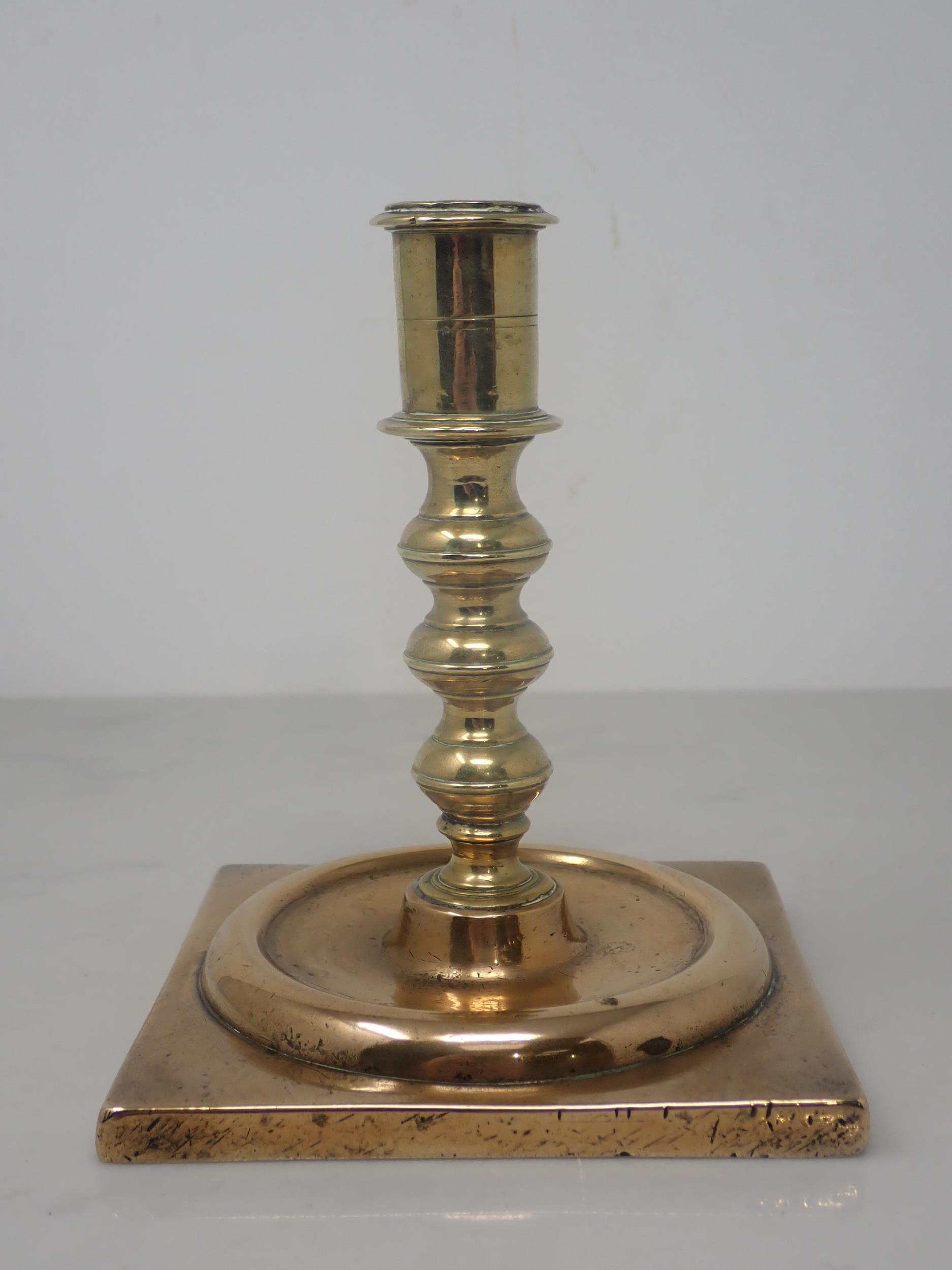 A Georgian brass Candlestick with knopped stem and square base, 5½in H - Image 2 of 6