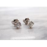 A pair of Diamond Ear Studs each claw-set brilliant-cut stone, total diamond weight 1.26cts, in 18ct