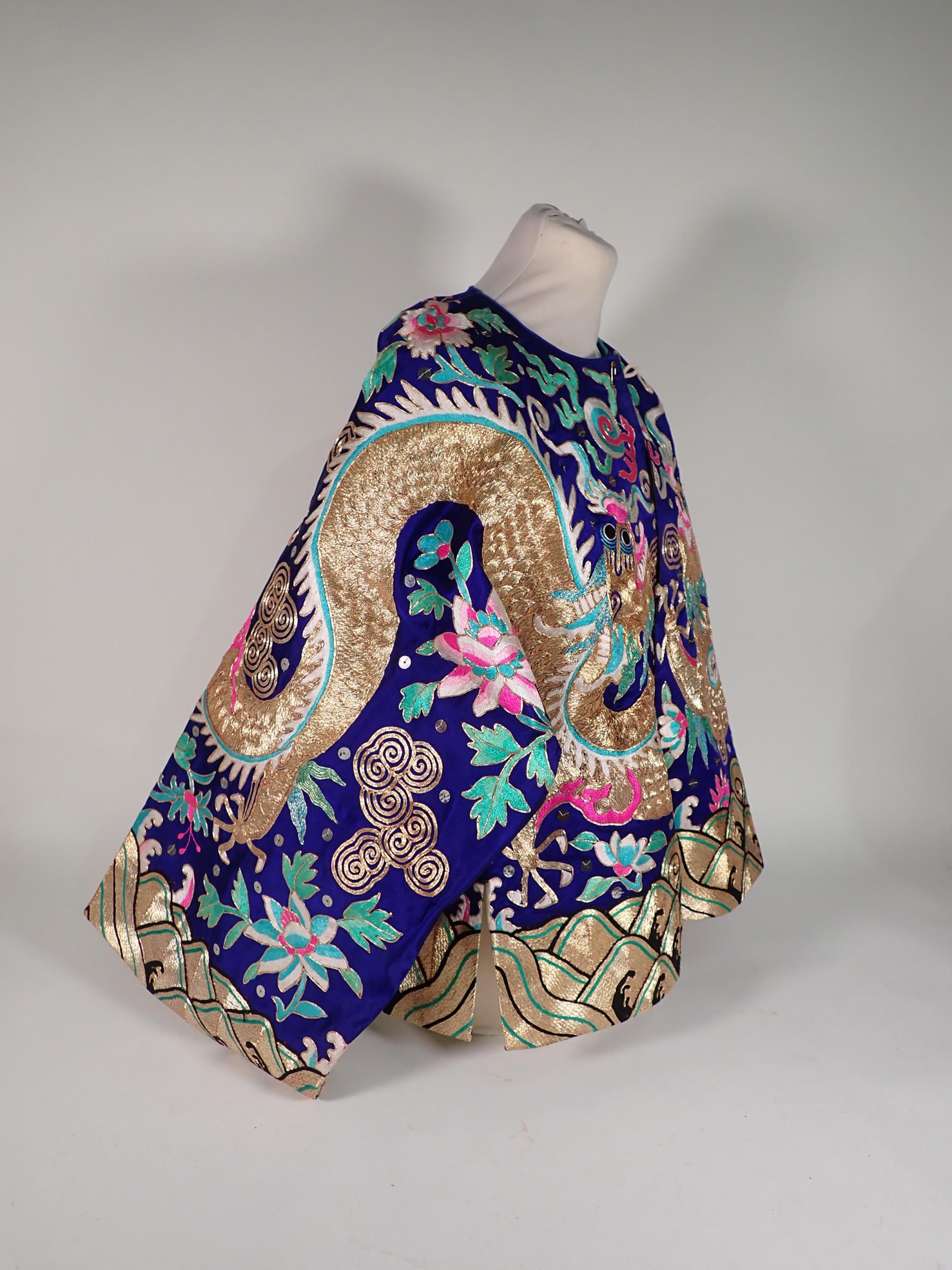 A late 19th/early 20th Century Chinese blue silk Jacket, embroidered gold and polychrome dragon, - Image 2 of 16