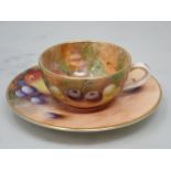 A Royal Worcester miniature Cup and Saucer painted still life of fruit, signed