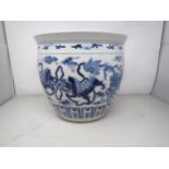 A Chinese blue and white Jardiniere painted four pairs of kylins amongst clouds, etc, 12in diam,