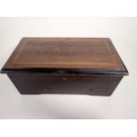 A late 19th Century Swiss Musical Box playing four airs, in rosewood and stained case, having floral