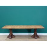 A burr oak Refectory Table in 16th Century style with three plank cleated top raised on two cross-