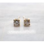 A pair of Diamond Ear Studs each claw-set brilliant-cut stone in 18ct gold, total diamond weight 0.