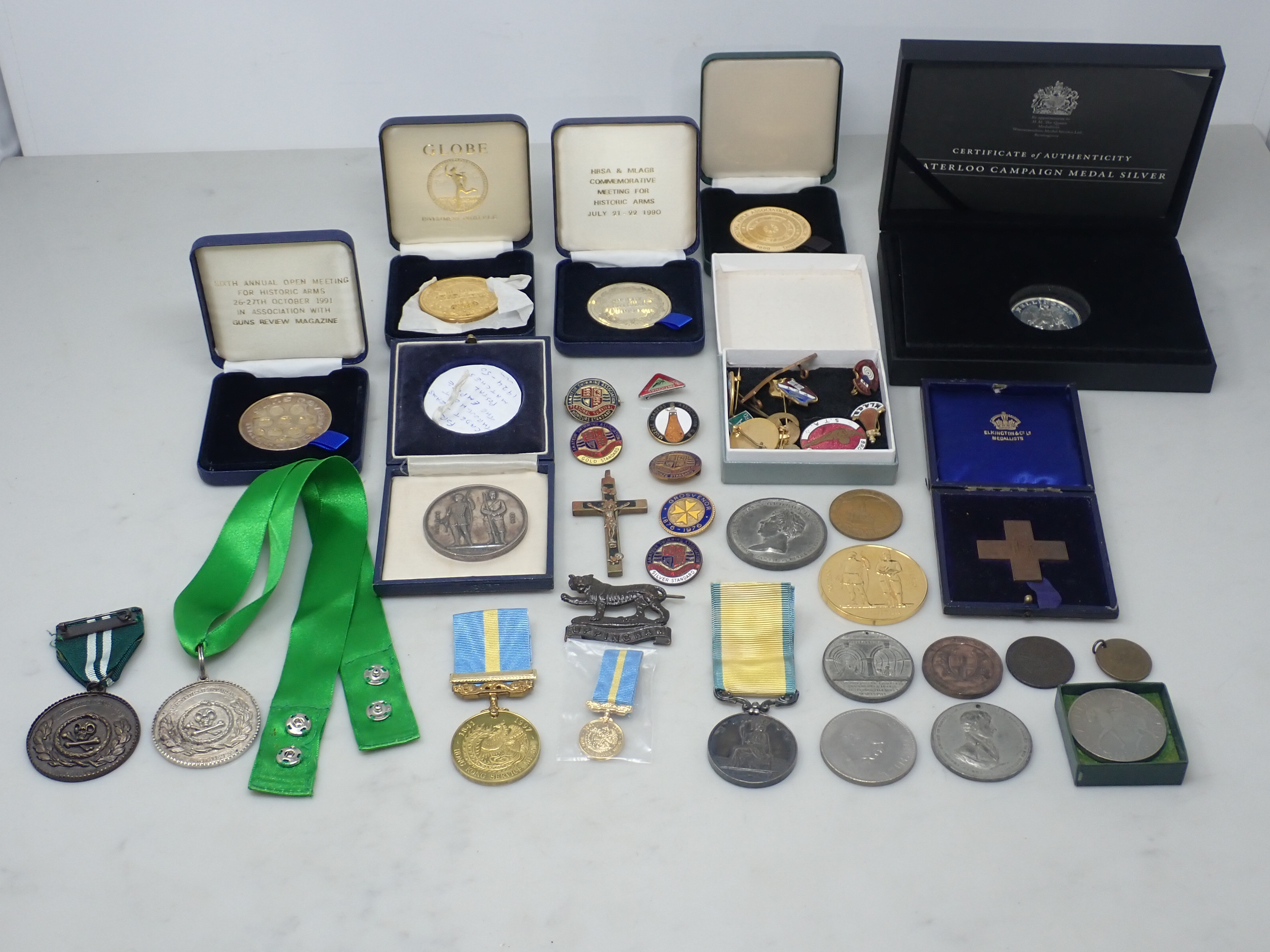 A collection of Medallions to include National Rifle Association, Bisley Centenary, George IV