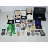 A collection of Medallions to include National Rifle Association, Bisley Centenary, George IV