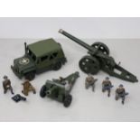 A Britains U.S.A. Military Jeep, two Artillery Guns and and five Royal Artillery Figures