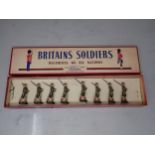 A boxed Set of Britains No.1901 The Cape Town Highlanders, strung, two rifles have loss to