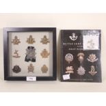 A framed collection of nine British Army Regiment Cap Badges including Army Cyclist Corps,