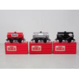 Hornby-Dublo 4676 ‘Esso’/ 4677 ‘Mobil’/ 4680 ‘Esso’ black, unused and boxed All three tankers in