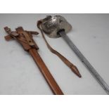 A First World War Officer's Dress Sword in leather covered wooden Scabbard with leather frog by