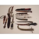 Five Eastern Daggers, a Japanese Tanto in bone Scabbard and two Sheath Knives