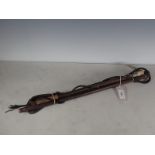 A Ladies Hunting Whip with antler grip, plared collar, plaited shaft and leather leash, a leather
