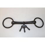 A antique cast iron horse bit