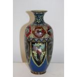A antique cloisonne vase on a blue ground 24cm tall