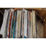 A box of assorted LP records