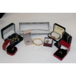 A selection of silver & gold tone boxed jewellery