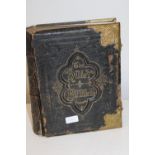 A Victorian family Bible with brass fittings (some wear to spine)