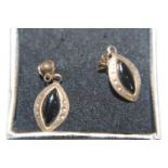 A pair of 9ct gold & black onyx drop earrings