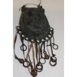 A antique Nigerian 'Benin' base metal purse