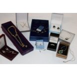 A selection of boxed silver & gold tone jewellery