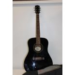 A Fender CD60-black acoustic guitar with case