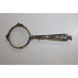 A antique silver plated lunette