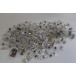 A large collection of costume jewellery mainly charms/beads