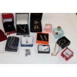 A selection of boxed silver & gold tone jewellery