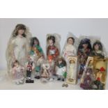 A large qty of collectable dolls