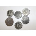 Five replica "pieces of eight" coins and a Chinese white metal coin