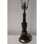 A antique bronze lamp base
