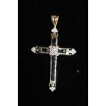 A 9ct gold cross set with sapphires & diamond chips 1.2 grams